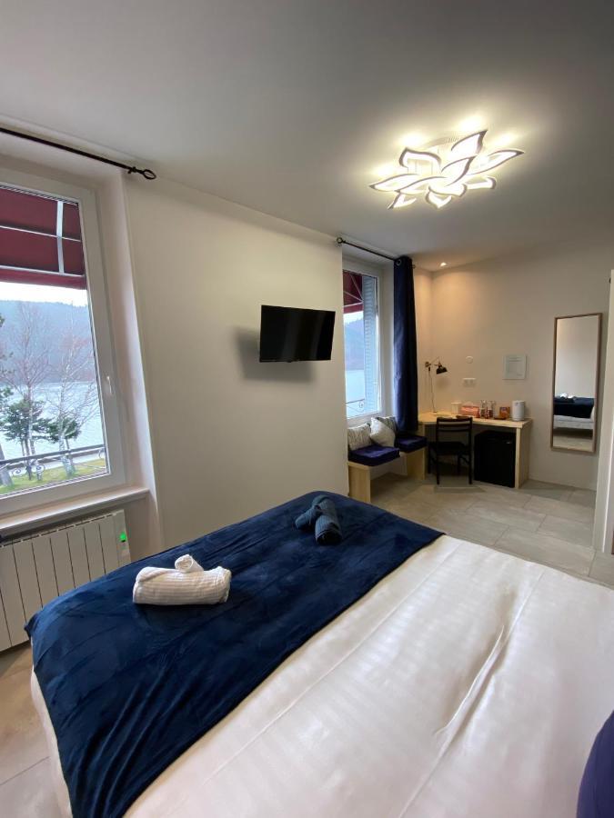 Hotel La Bonne Hotesse Chambon-sur-Lac Esterno foto